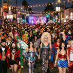 Crowd in costumes at West Hollywood Halloween Carnaval street festival