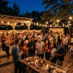 Warm string lights illuminating a cozy Texas backyard evening party.
